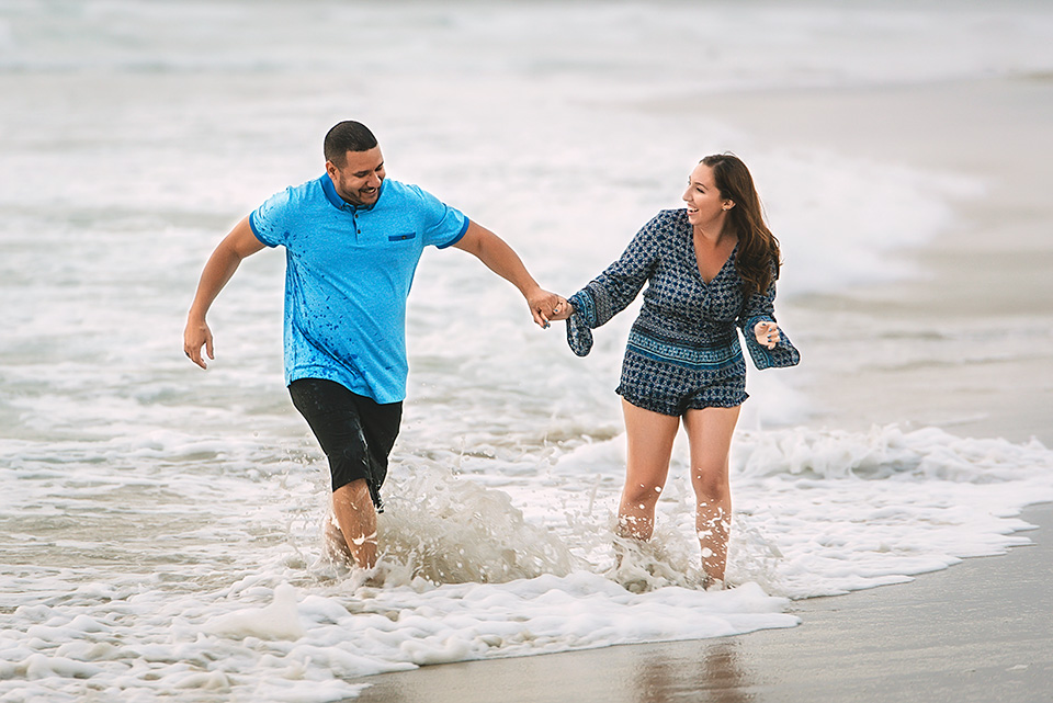 couple-playing-in-water-engagement-session-san-diego-mission-beach