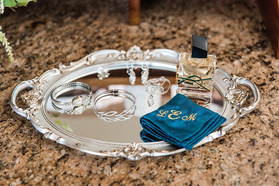 elegant silver tray bridal details jewelry perfume handkerchief Coronado hotel