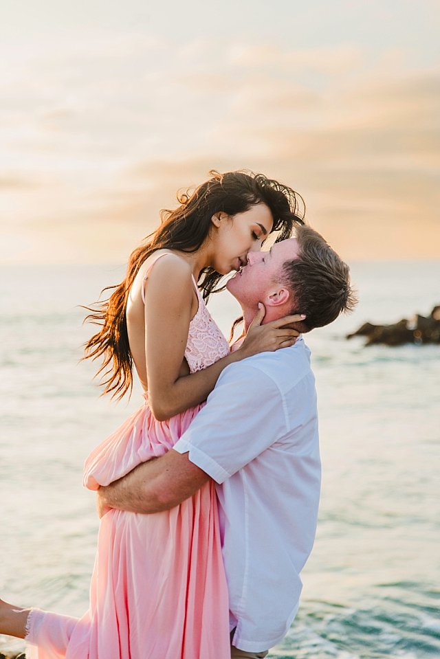 romantic couple kiss san diego beach photographer