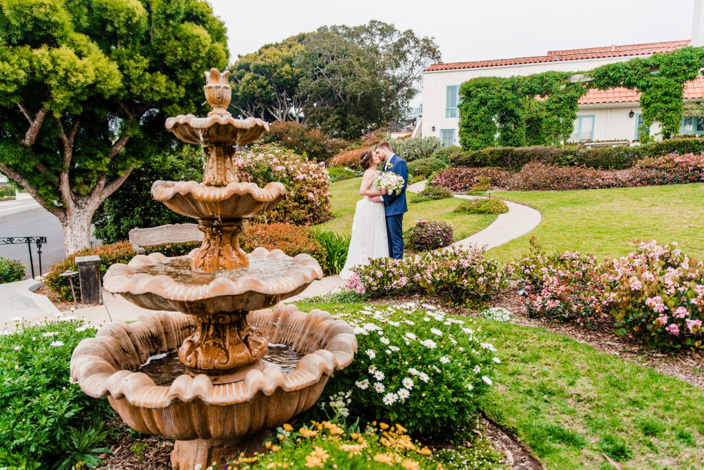bride and groom in garden at Thursday Club wedding venue San Diego