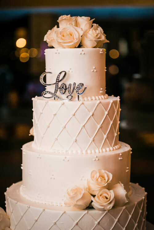 four-tiered-wedding-cake-white-roses