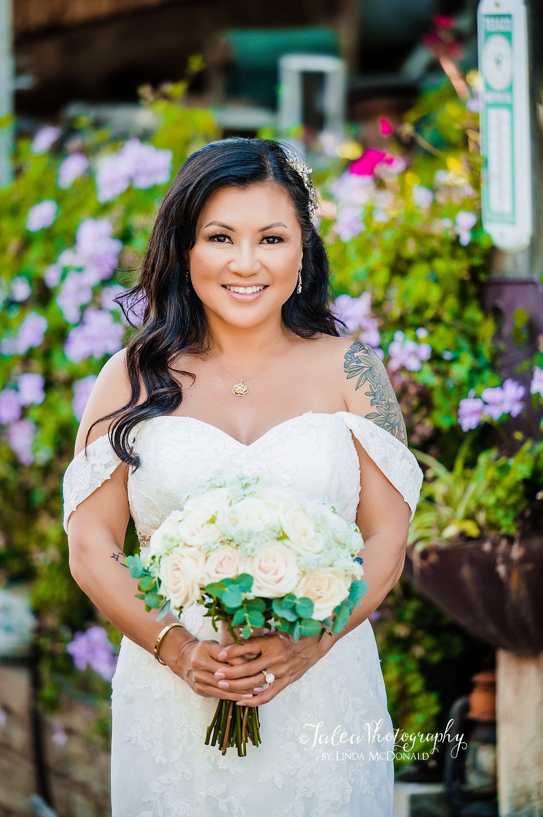 bride posing with bouquet at winery wedding san diego