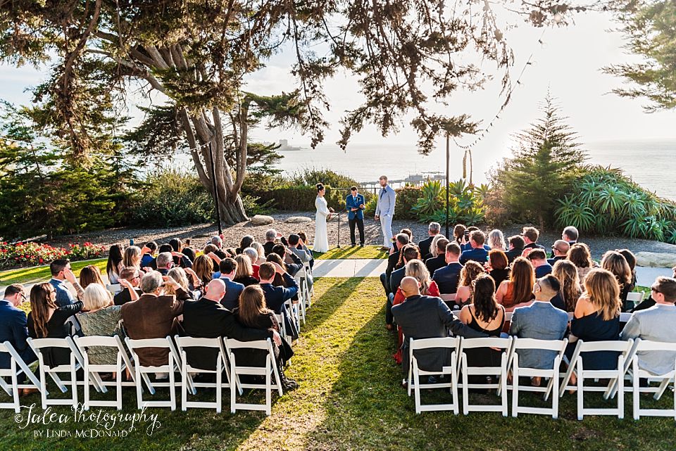 wide angle view of ceremony site at Martin Johnson House venue with Pacific Ocean in the background