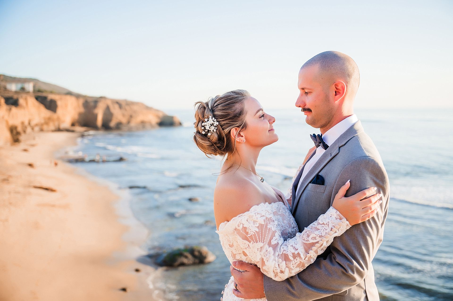 Wedding portrait with Sunset Cliffs and the Pacific Ocean in the background